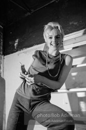 Edie Sedgwick on the steps leading
to Billy Name’s sleeping quarters
at the Factory. 1965.