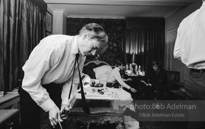 Andy Warhol while preparing the set in a New York City apartment for the film Beauty #2. 1965.