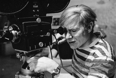 Andy Warhol behind the camera during the filming of 