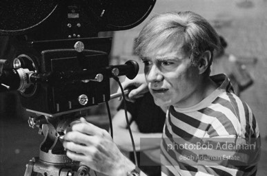 Andy Warhol behind the camera during the filming of 