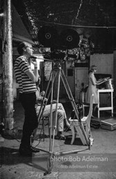 Andy Warhol behind the camera during the filming of 