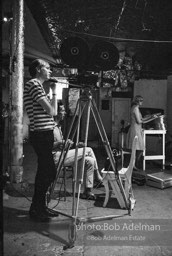 Andy Warhol behind the camera during the filming of 