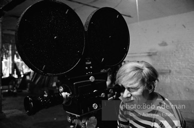 Andy Warhol behind the camera during the filming of 