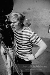 Andy Warhol behind the camera during the filming of 