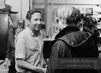 Robert Rauschenberg and Andy Warhol at a party at Raucshenberg's loft. New York city, 1965.