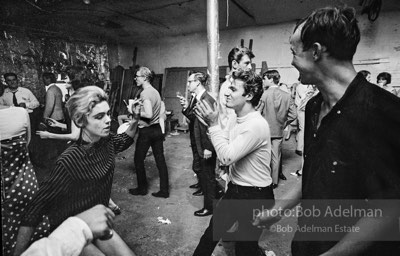 Edie Sedgwick and Gerard Melanga dancing together at a party at Warhol's Factory. New York City, 1965.