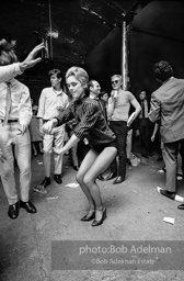 Edie Sedgwick dances at a party at Warhol's Factory. New York City, 1965.