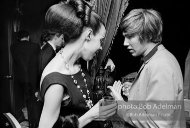 Isabel Nash Eberstatd and Chuck Wein at a society party. New York City, 1965.
