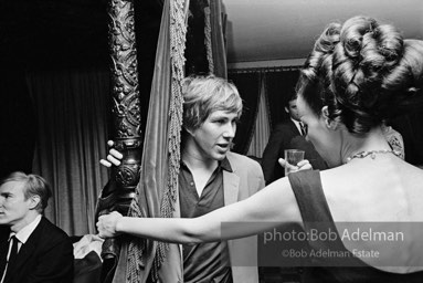 Isabel Nash Eberstatd and Chuck Wein at a society party. New York City, 1965.