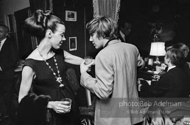 Isabel Nash Eberstatd and Chuck Wein at a society party. New York City, 1965.