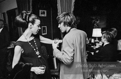 Isabel Nash Eberstatd and Chuck Wein at a society party. New York City, 1965.