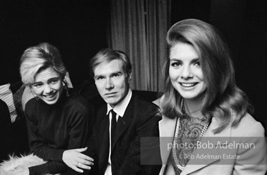 Edie Sedgwick and Andy Warhol with unidentified guest at a society party. New York City, 1965.