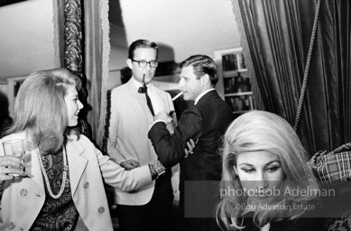 Baby Jane Holzer (right).Society party. New York City, 1965.