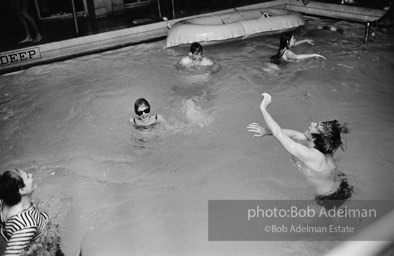 Andy Warhol, Edie Sedgwick and Chuck Wein ata pool party at Al Roon's gym.New York City, 1965.