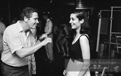 Artist Marisol Escobar dances at a party at Al Roon's gym. New York City, 1965.