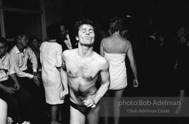 Gerard Melanga dances at a pool party at Al Roon's Gym. New York City, 1965.