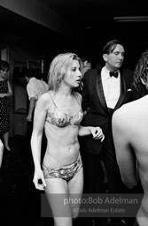 Warhol Superstar Baby Jane Holzer dances at a pool party at Al Roon's Gym. New York City, 1965. Warhol Superstar Baby Jane Holzer dances at a pool party at Al Roon's Gym. New York City, 1965.
