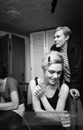 Andy Warhol and Edie Sedgwick at an east-side dinner party. New York City, 1965.