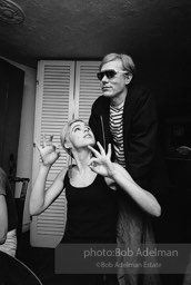 Andy Warhol and Edie Sedgwick at an east-side dinner party. New York City, 1965.