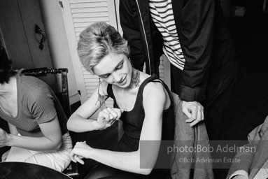 Andy Warhol and Edie Sedgwick at an east-side dinner party. New York City, 1965.