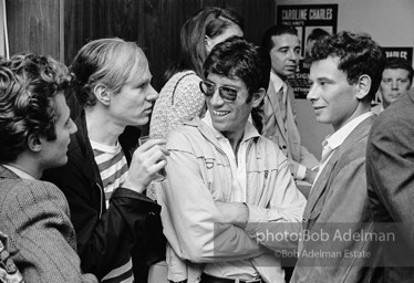 Gerard Melanga and Andy Warhol at a party. New York City, 1965.