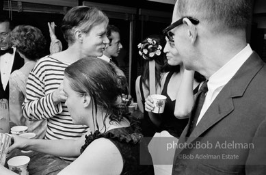 Andy Warhol talks with Marisol. Al Roon's gym. New York City, 1965.