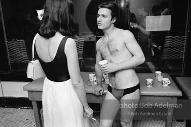 Marisol and Gerard Melanga at a pool party at Al Roon's gym. New York City, 1965.