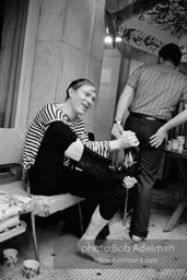 Andy Warhol after being pushed into the pool by Edie Sedgwick. Al Roon's Gym, New York City, 1965.