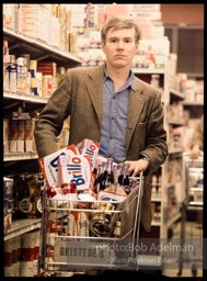 Andy Warhol shops at Gristede's market. New York City, 1964.