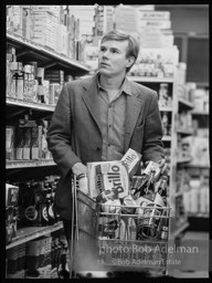 Andy Warhol shops at Gristede's market. New York City, 1964.