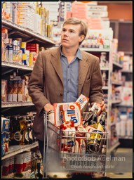 Andy Warhol shops at Gristede's market. New York City, 1964.