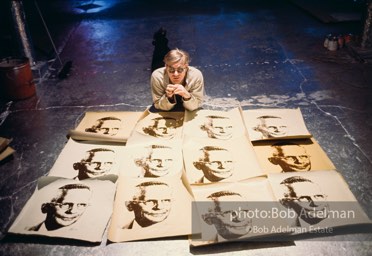 Andy Warhol with prints of The
American Man (Portrait
of Watson Powell) (1964)
on the Factory floor.