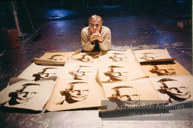 Andy Warhol with prints of The
American Man (Portrait
of Watson Powell) (1964)
on the Factory floor.