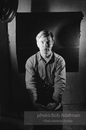 Andy Warhol photographed using his portrait lighting and background cloth at the Factory. 1965.