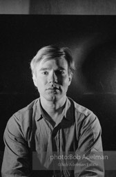 Andy Warhol photographed using his portrait lighting and background cloth at the Factory. 1965.