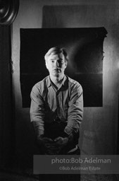 Andy Warhol photographed using his portrait lighting and background cloth at the Factory. 1965.