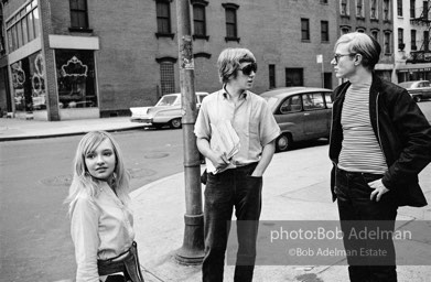 Bibbe Hansen, Chuck Wein,
Gerard Malanga and Andy
looking for a cab on the corner of
East 47th Street and 2nd Avenue. 1965.