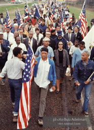 Martin Luther King leads the Selma to Montgomery march as it approaches it's finale in Montgomery, Alabama. 1965