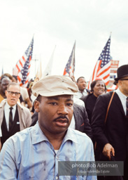 Martin Luther King leads the Selma to Montgomery march as it approaches it's finale in Montgomery, Alabama. 1965