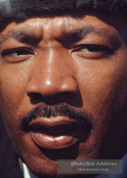 Martin Luther King, wearing a borrowed hat, on the Selma to Montgomery march, Alabama, 1965
