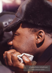Martin Luther King, wearing a borrowed hat, on the Selma to Montgomery march, Alabama, 1965